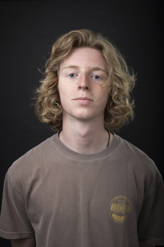 Headshot of Eli Hutchison