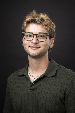 Headshot of Sully Alvarez